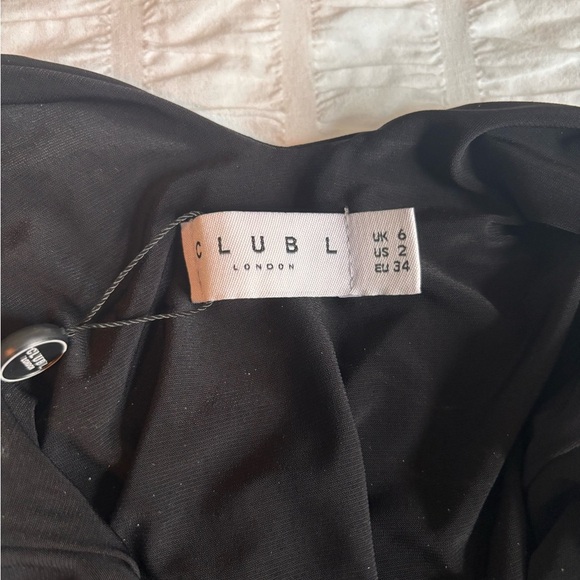 Elegant Black Sleeveless Dress - Picture 6 of 8